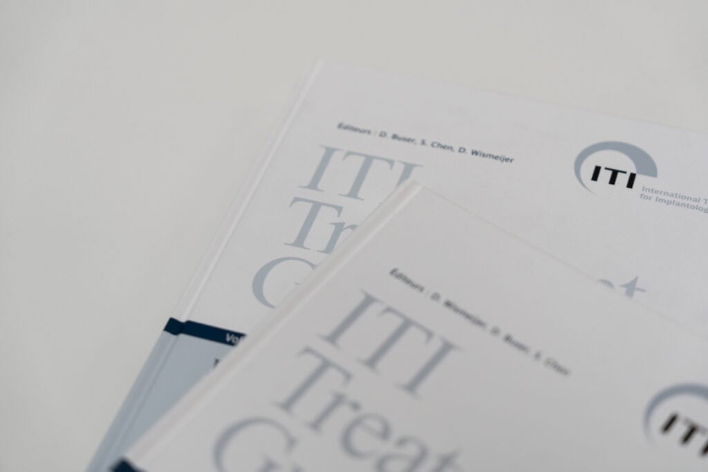 Close-up of ITIT training certification documents showcasing professional development credentials.