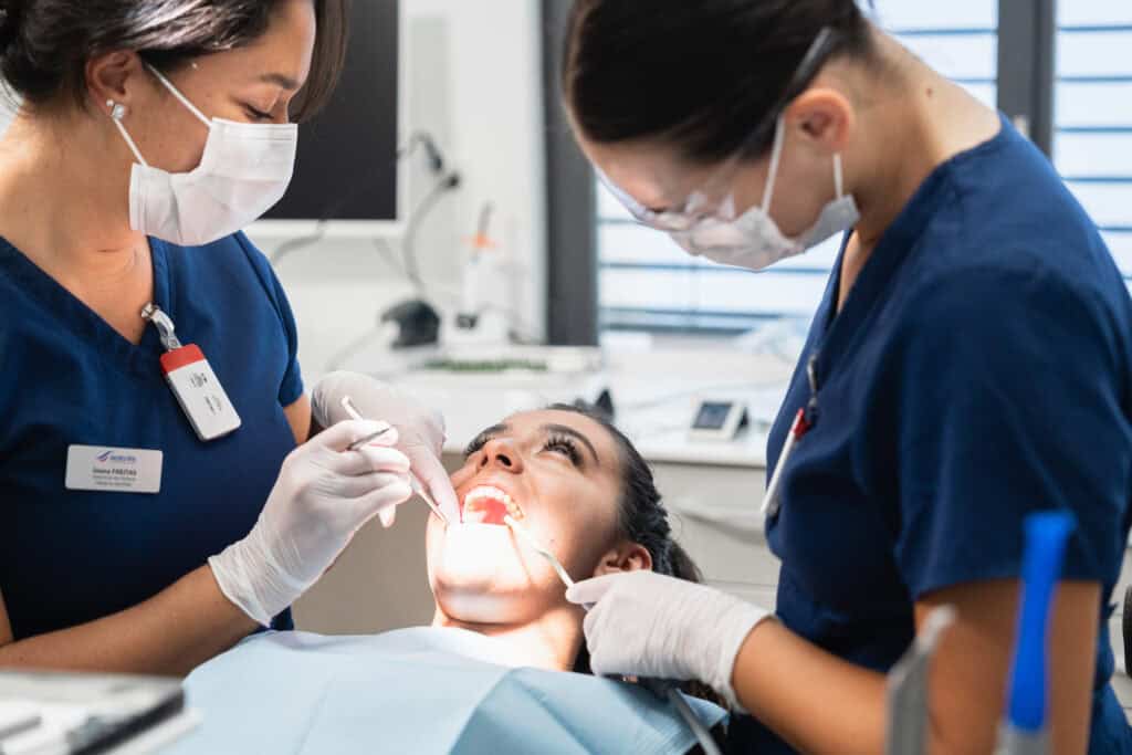 Dental treatment, dental care, oral health, dental professionals, patient care, dental clinic, dentistry, dental hygiene, dental procedure, oral examination.