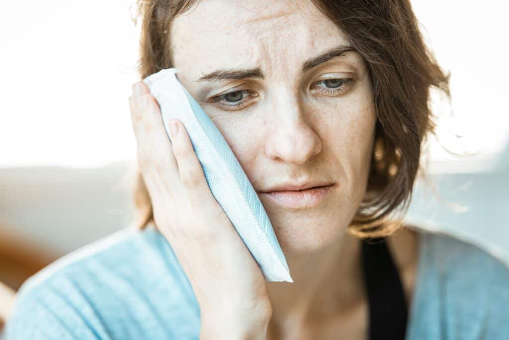 Earache, ear pain, woman with ear infection, health, medical, discomfort, illness, healthcare, wellness, treatment.